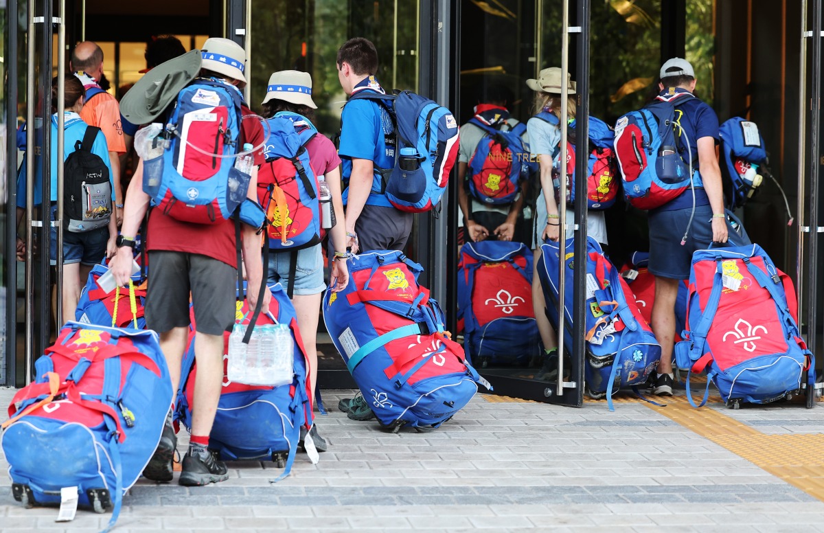 British scouts arrive at a hotel in Seoul on August 5, 2023, after leaving the World Scout Jamboree in Buan, North Jeolla province. Photo by Yonhap / YONHAP / AFP