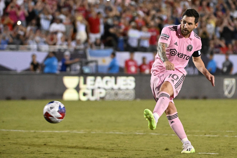 Lionel Messi #10 of Inter Miami CF takes his penalty kick attempt during the Leagues Cup 2023 Round of 16 match between Inter Miami CF and FC Dallas at Toyota Stadium on August 06, 2023 in Frisco, Texas. Logan Riely/Getty Images/AFP