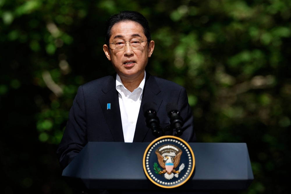 Japanese Prime Minister Kishida Fumio delivers remarks during a joint news conference with U.S. President Joe Biden and South Korean President Yoon Suk Yeol following three-way talks at Camp David on August 18, 2023 in Camp David, Maryland. Photo by CHIP SOMODEVILLA / GETTY IMAGES NORTH AMERICA / Getty Images via AFP