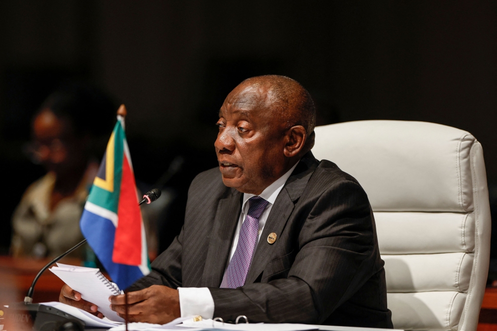 South African President Cyril Ramaphosa delivers his remarks at the plenary session during the 2023 BRICS Summit at the Sandton Convention Centre in Johannesburg on August 23, 2023. (Photo by Gianluigi Guercia / Pool / AFP)