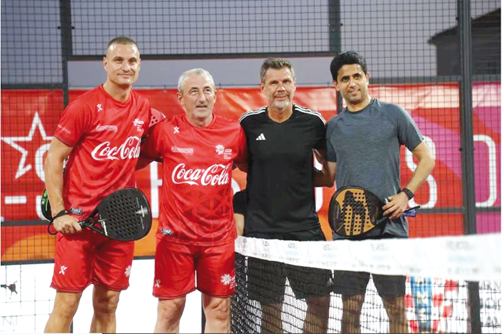 Paris Saint-Germain President Nasser Al Khelaifi (right), a Global Ambassador of the YSG programme, poses for a photograph along with other participants on sidelines of padel match.    