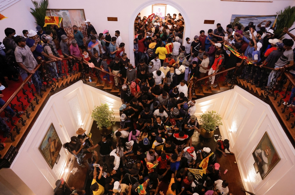 File photo: Demonstrators protest inside the President's House premises, after President Gotabaya Rajapaksa fled, amid the country's economic crisis, in Colombo, Sri Lanka July 9, 2022. (REUTERS/Dinuka Liyanawatte)