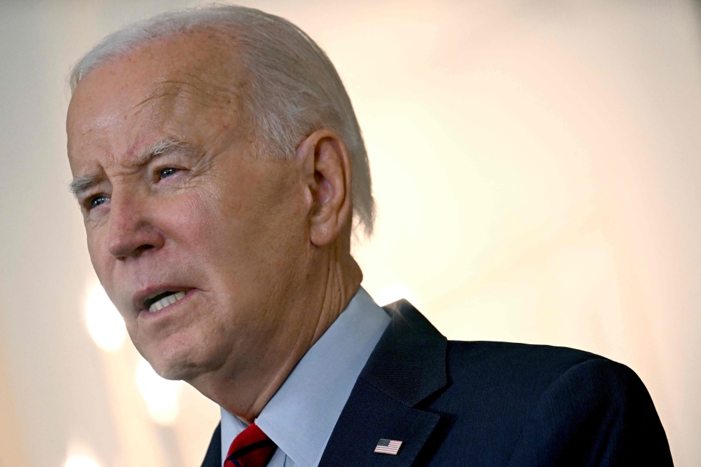 US President Joe Biden speaks about strengthening US ports and supply chains after the International Longshore and Warehouse Union and the Pacific Maritime Association finalized a new contract covering west coast ports, in the State Dining Room of the White House in Washington, DC, on September 6, 2023. (Photo by Jim WATSON / AFP)