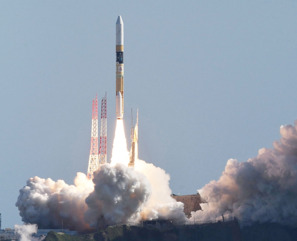 A H-IIA rocket carrying a small lunar surface probe and other objects lifts off from the Tanegashima Space Centre on Tanegashima island, Kagoshima prefecture on September 7, 2023. (Photo by JIJI Press / AFP) 