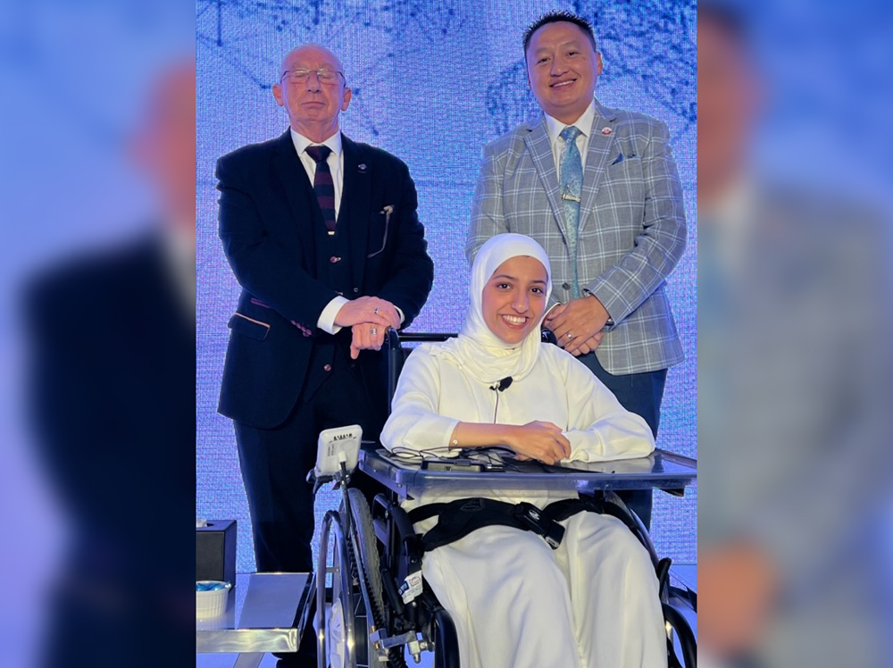 Mariam Al Ibrahim (centre) and others at the National Forum for Human Rights. 