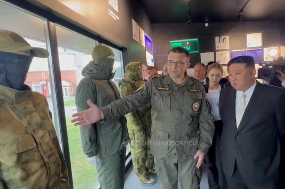 This video grab taken from footage posted on the official Telegram account of Primorsky region governor Oleg Kozhemyako on September 17, 2023, shows North Korea's leader Kim Jong Un (R) visiting an exhibition of military and dual-use goods in Vladivostok. (Photo by Handout / Telegram / @kozhemiakoofficial / AFP) 