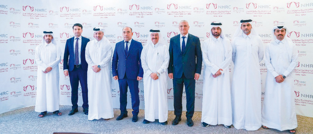 NHRC officials with officials from Uzbekistan's NCHR during the event.