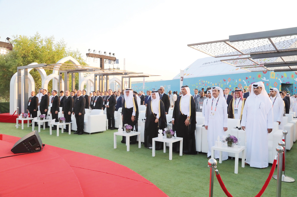 Minister of Municipality H E Dr. Abdullah bin Abdulaziz bin Turki Al Subaie (fourth right), Minister of Environment and Climate Change Sheikh H E Dr. Faleh bin Nasser bin Ahmed bin Ali Al Thani (third right), Minister of State and President of the Qatar National Library H E Dr. Hamad bin Abdulaziz Al Kuwari (fifth right) during a ceremony to mark National Day of the Republic of Turkmenistan at Expo 2023 Doha.