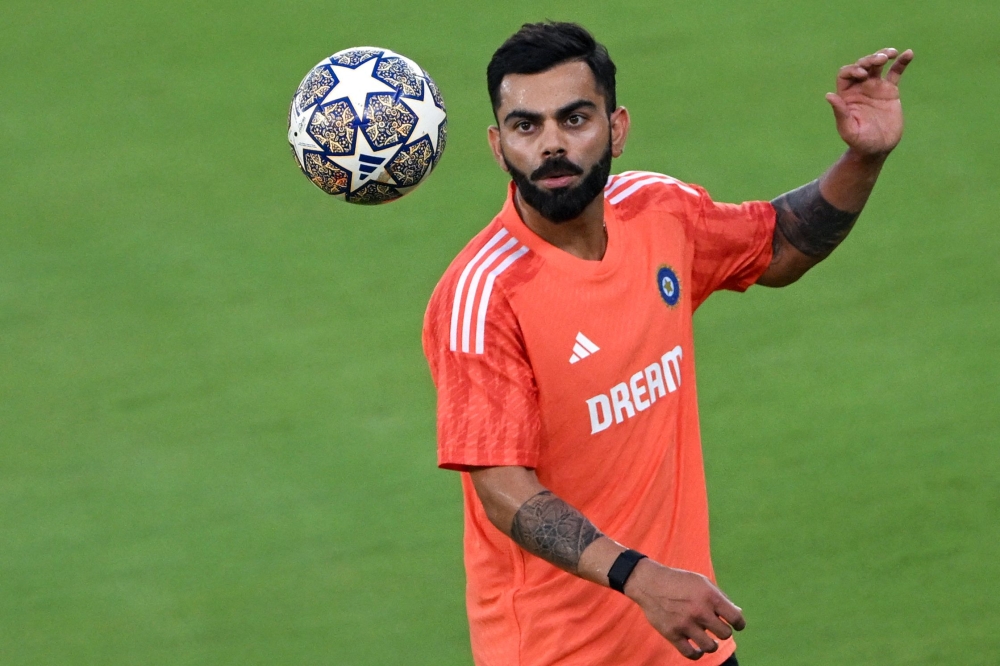 India's Virat Kohli takes part in a practice session on the eve of the 2023 ICC Men's cricket World Cup one-day international (ODI) match between India and Pakistan at the Narendra Modi Stadium in Ahmedabad on October 13, 2023. (Photo by Punit Paranjpe / AFP)