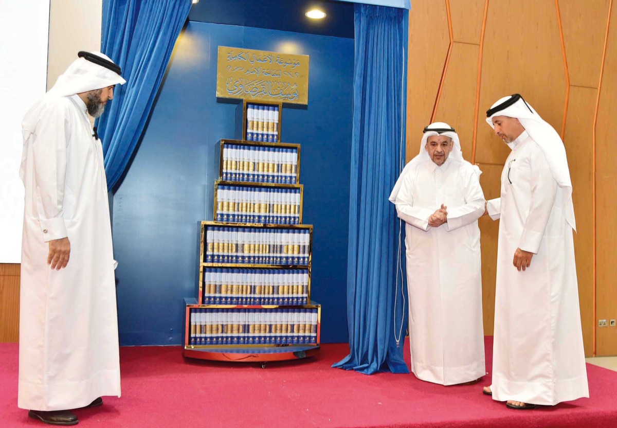 QU president Dr. Omar Al Ansari (second right) during the launch of the encyclopaedia.