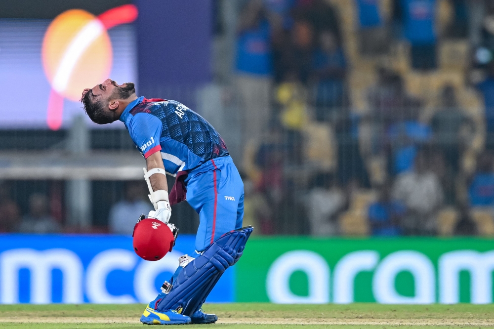 Afghanistan's captain Hashmatullah Shahidi celebrates after winning the 2023 ICC Men's Cricket World Cup one-day international (ODI) match between Pakistan and Afghanistan at the MA Chidambaram Stadium in Chennai on October 23, 2023. (Photo by R.Satish BABU / AFP) 