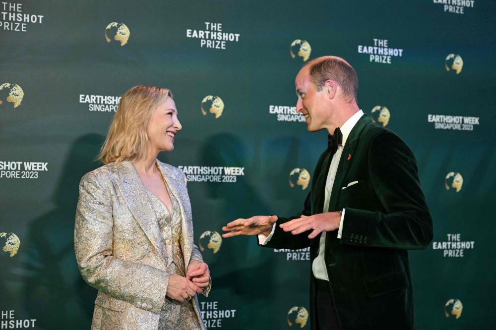 Britain's Prince William, Prince of Wales speaks with Australian actress Cate Blanchett as they arrive to attend the 2023 Earthshot Prize in Singapore on November 7, 2023. (Photo by Mohd Rasfan / AFP)