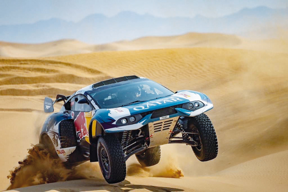 Qatar's Nasser Saleh Al Attiyah and his French co-driver Mathieu Baumel in their Prodrive Hunter during yesterday's stages of the Dubai International Baja. 