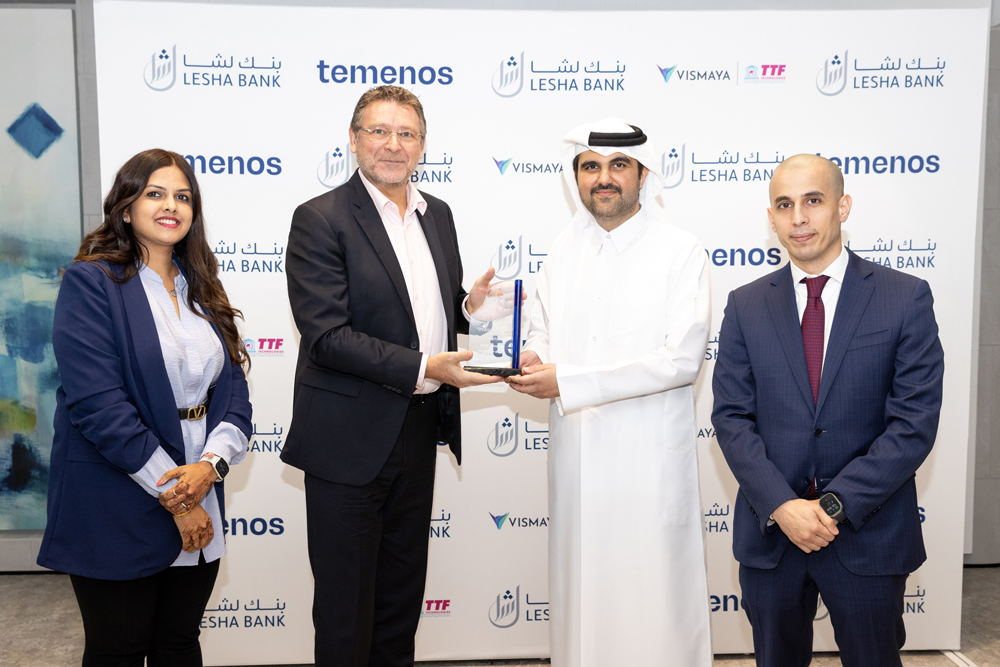 Officials pose for a group photo as Lesha Bank is announced the first bank in the Middle East and Africa to succesfully complete Temenos Transact R23 upgrade.