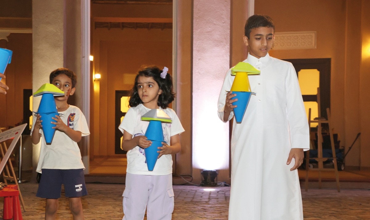 Children making a presentation at the event.