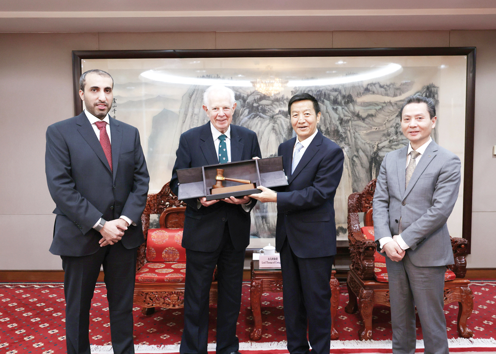 QICDRC President Rt. Hon. The Lord Thomas of Cwmgiedd, QICDRC CEO Faisal Rashid Al Sahouti with other officials during the meeting.