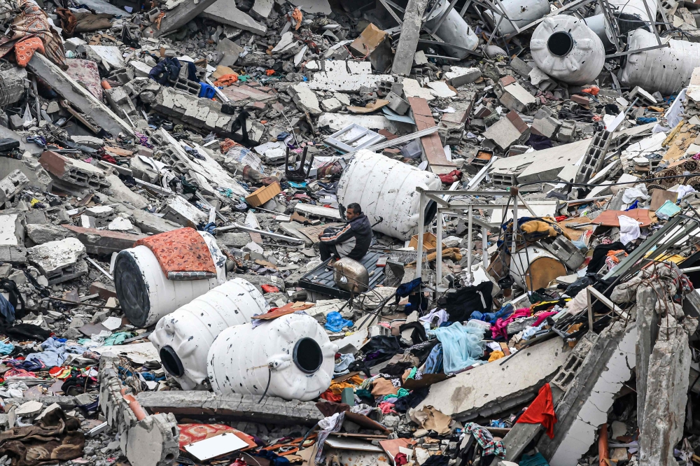 Destruction caused by Israeli strikes in Wadi Gaza, in the central Gaza Strip on November 28, 2023, amid a truce in battles between Israel and Hamas. (Photo by Mahmud Hams / AFP)