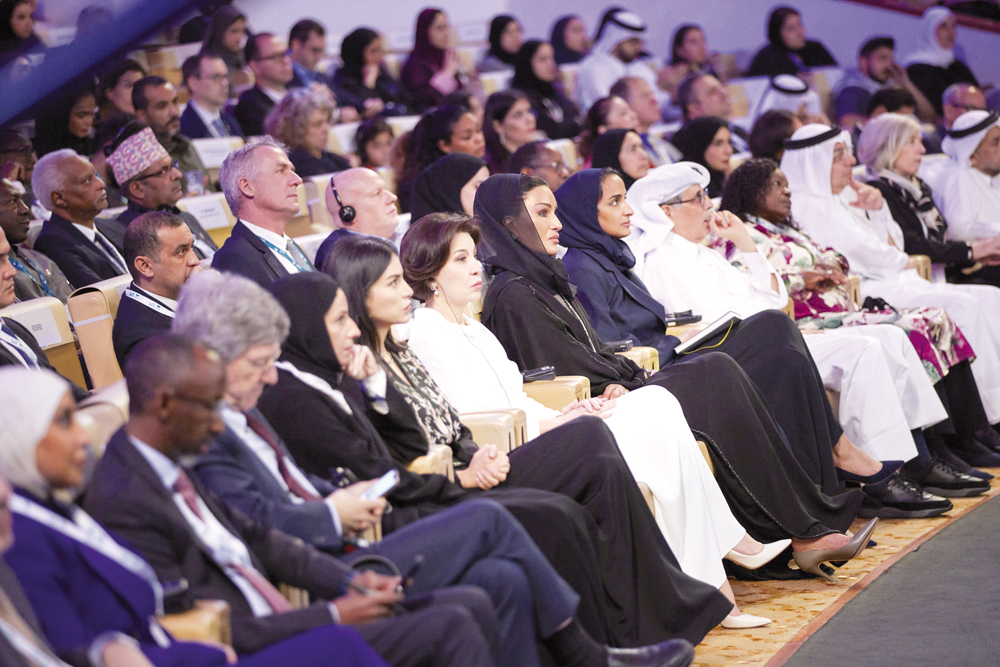 H H Sheikha Moza bint Nasser, Chairperson of the Education Above All Foundation, along with other dignitaries and participants during the plenary session on education. 