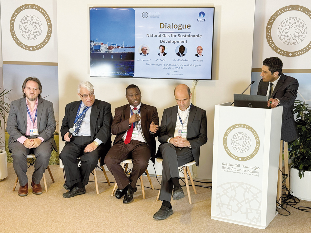Experts exchange ideas during a dialogue session at the Al-Attiyah Foundation pavilion.