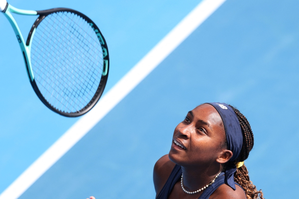 USA's Coco Gauff throws up her racquet during her women's singles semi-final match against compatriot Emma Navarro at the Auckland Classic tennis tournament in Auckland on January 6, 2024 (Photo by Michael Bradley / AFP)