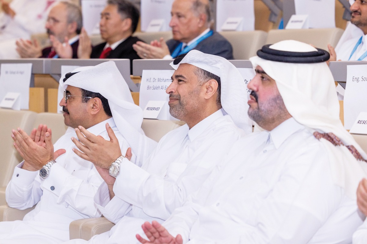 Minister of Environment and Climate Change, H E Sheikh Dr. Faleh bin Nasser bin Ahmed bin Ali Al Thani (centre); former Minister of Energy and Industry, H E Dr. Mohammed bin Saleh Al Sada (left) and other officials during the conference. 