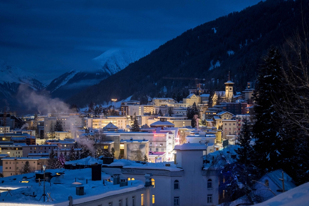 A photograph shows a view of the alpine resort of Davos on the opening day of the annual World Economic Forum (WEF) in Davos on January 15, 2024. (Photo by Fabrice Coffrini / AFP)