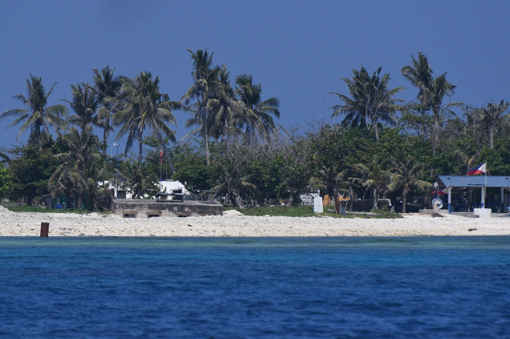 This photo shows a general view of the Philippine-occupied Thitu island in the disputed South China Sea on April 21, 2023. Photo by Ted ALJIBE / AFP