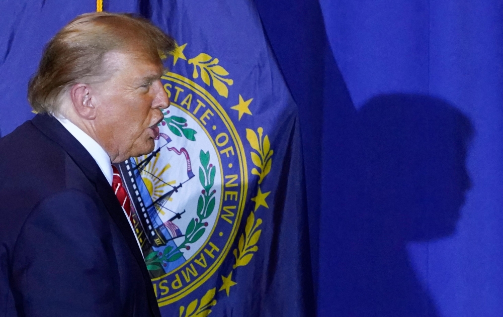 US Republican presidential hopeful and former US President Donald Trump speaks during a campaign event in Concord, New Hampshire, on January 19, 2024. (Photo by TIMOTHY A. CLARY / AFP)
