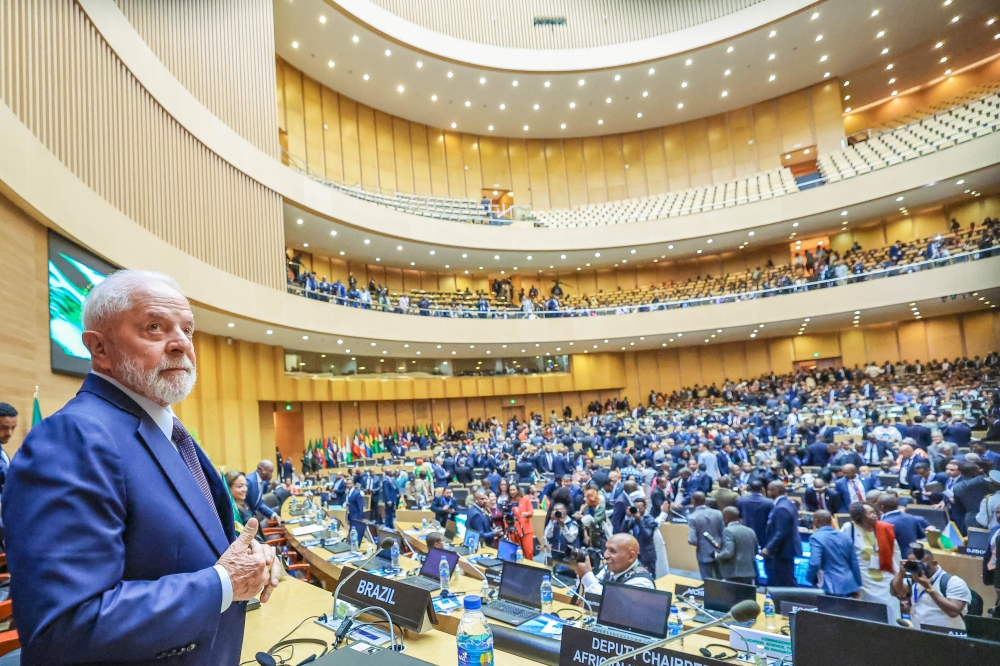 This handout picture released by the Brazilian Presidency shows Brazil's President Luiz Inacio Lula da Silva (L) attending the opening ceremony of the 37th Ordinary Session of the Assembly of the African Union (AU) at the AU headquarters in Addis Ababa on February 17, 2024. (Photo by Ricardo STUCKERT / Brazilian Presidency / AFP)