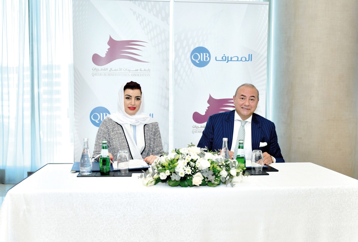 QBWA Vice Chairman, Aisha Alfardan and Group CEO of QIB, Bassel Gamal during the signing ceremony.