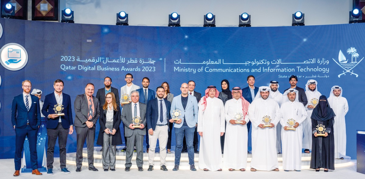 Minister of Communications and Information Technology H E Mohammed bin Ali Al Mannai with winners of Qatar Digital Business Awards 2023.