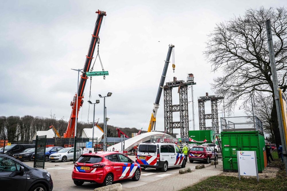 A photo shows a part of a bridge under construction in Lochem, that has collapsed, on February 21, 2024.  