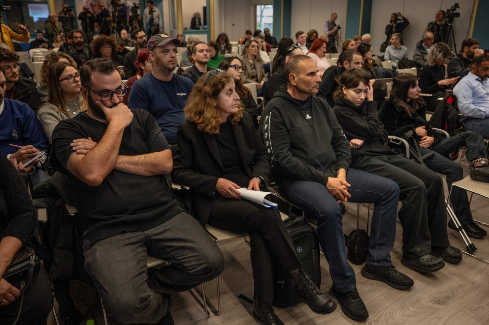 Relatives and friends of victims take part in a press conference in Athens on February 26, 2024. (Photo by Angelos TZORTZINIS / AFP)
 