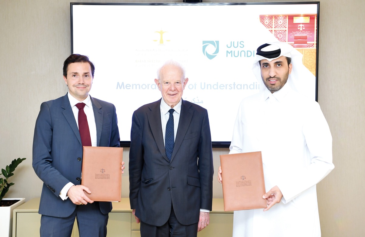 QICDRC, Jus Mundi officials during the signing of Memorandum of Understanding.