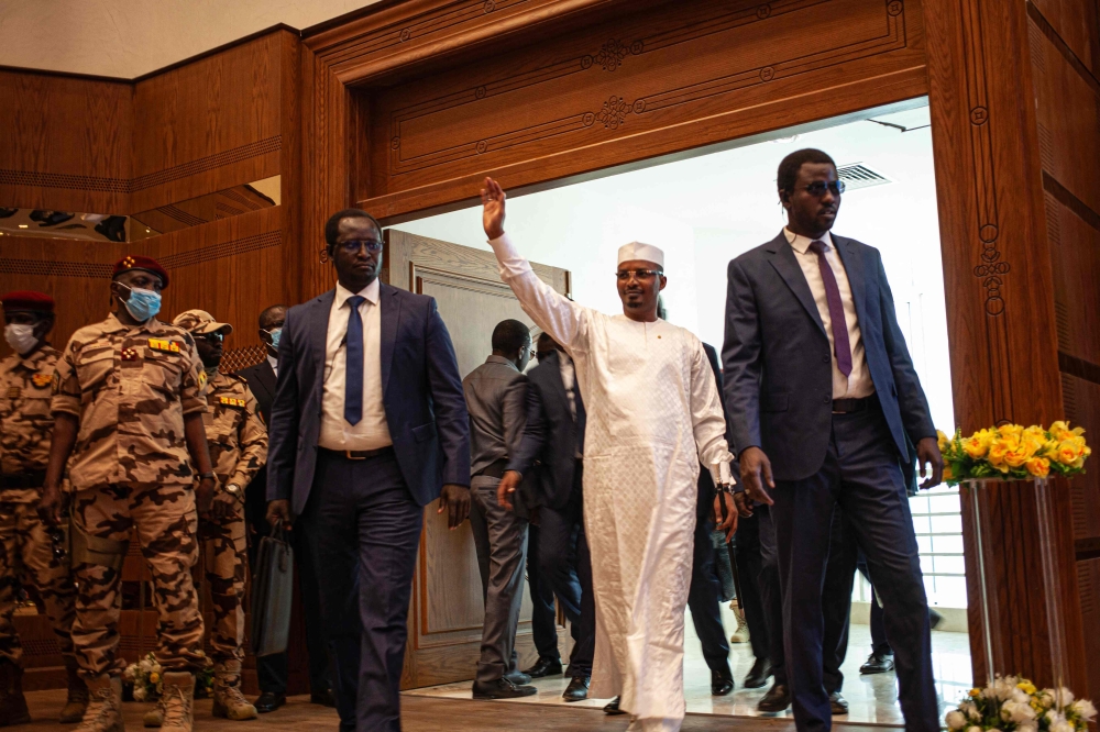 Chad transitional president General Mahamat Idriss Deby greets supporters as he arrives at the Chadian Ministry of Foreign Affairs ahead of the start of an inauguration meeting of a coalition of parties for his candidacy for the presidential election of May 6 in N'Djamena on March 2, 2024. (Photo by AFP)
