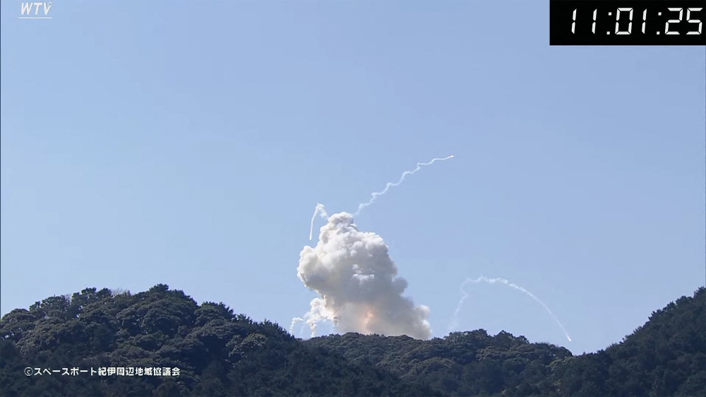 A frame grab taken from AFPTV via online footage broadcast by Wakayama Telecasting Corp. (WTV) on March 13, 2024 shows smoke rising after the Space One rocket exploded upon take-off. (Photo by AFPTV / AFP) 