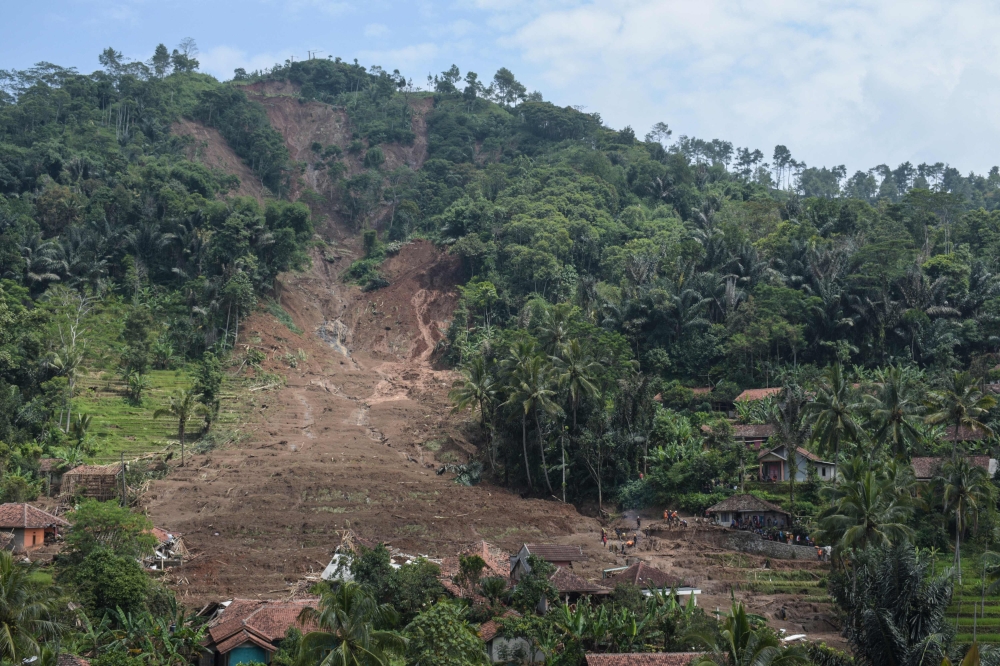 General view of a landslide site in Cipongkor, West Java province on March 25, 2024. Photo by Timur MATAHARI / AFP