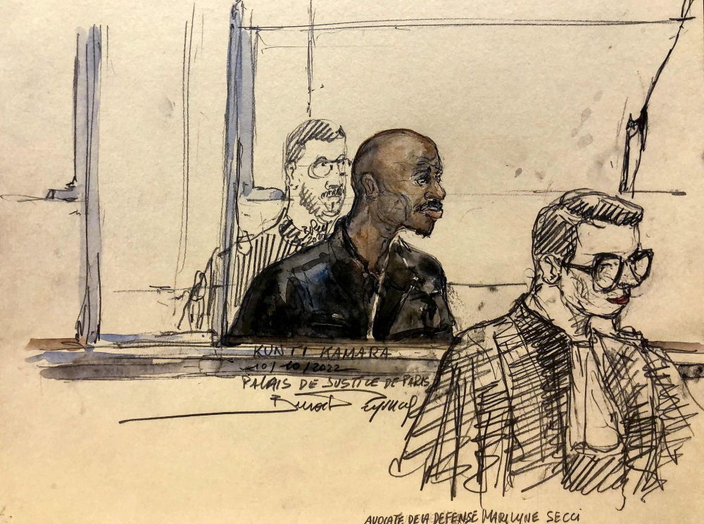(FILES) This court-sketch made on October 10, 2022, shows former regional commander of the United Liberation Movement of Liberia for Democracy (ULIMO), a rebel group that fought the National Patriotic Front of ex-president Charles Taylor, Kunti Kamara (C) facing charges of crimes against humanity, including torture, at the Paris criminal court, in Paris. (Photo by Benoit PEYRUCQ / AFP)