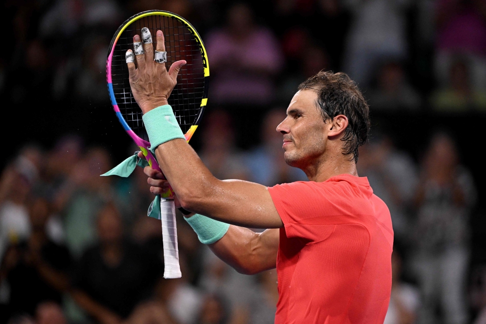 File: Spain's Rafael Nadal celebrates victory after his men's singles match against Jason Kubler of Australia at the Brisbane International tennis tournament in Brisbane on January 4, 2024.  (Photo by William West / AFP) 