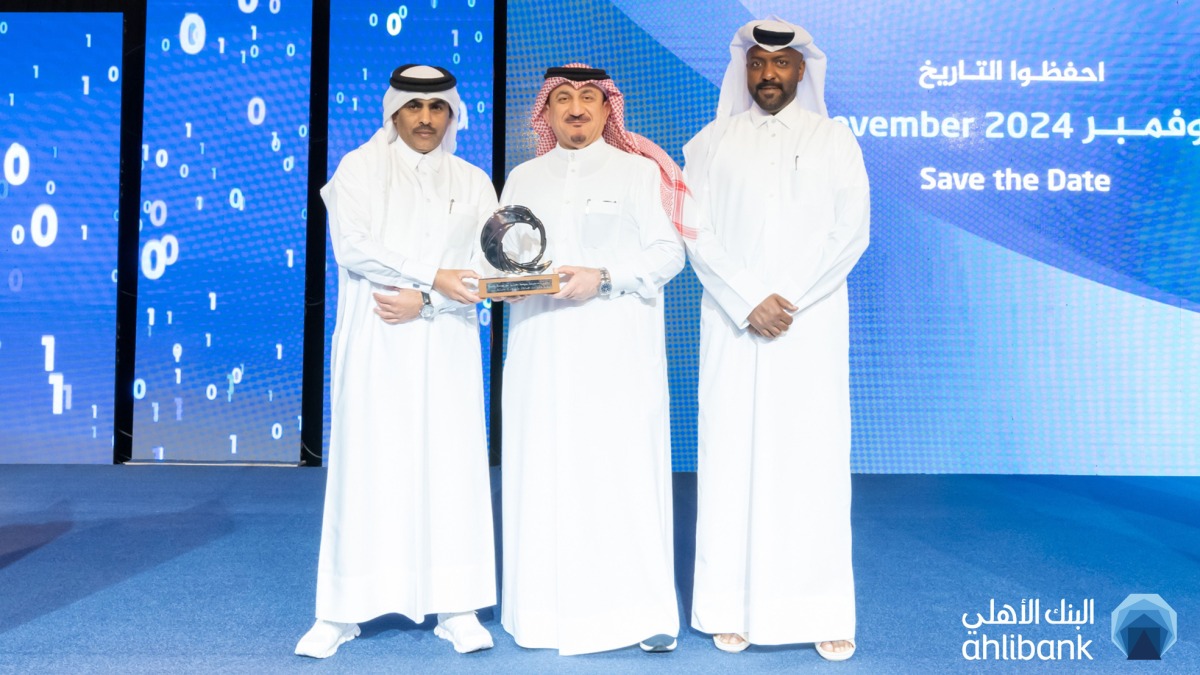 Ahli Bank officials receiving the award.