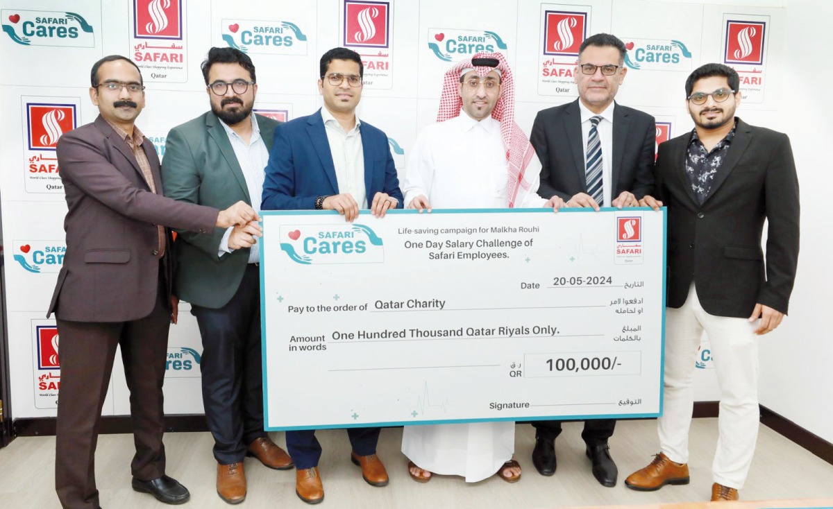 Managing Director of Safari Group of Companies, Shaheen Backer, and Safari’s management representatives handing over the cheque.