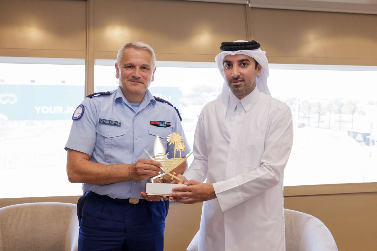 Director of the Government Communications Office H E Sheikh Jassim bin Mansour bin Jabor Al Thani with the Head of the Information and Public Relations Service of the French National Gendarmerie, Jean-Valery Letterman, yesterday.  