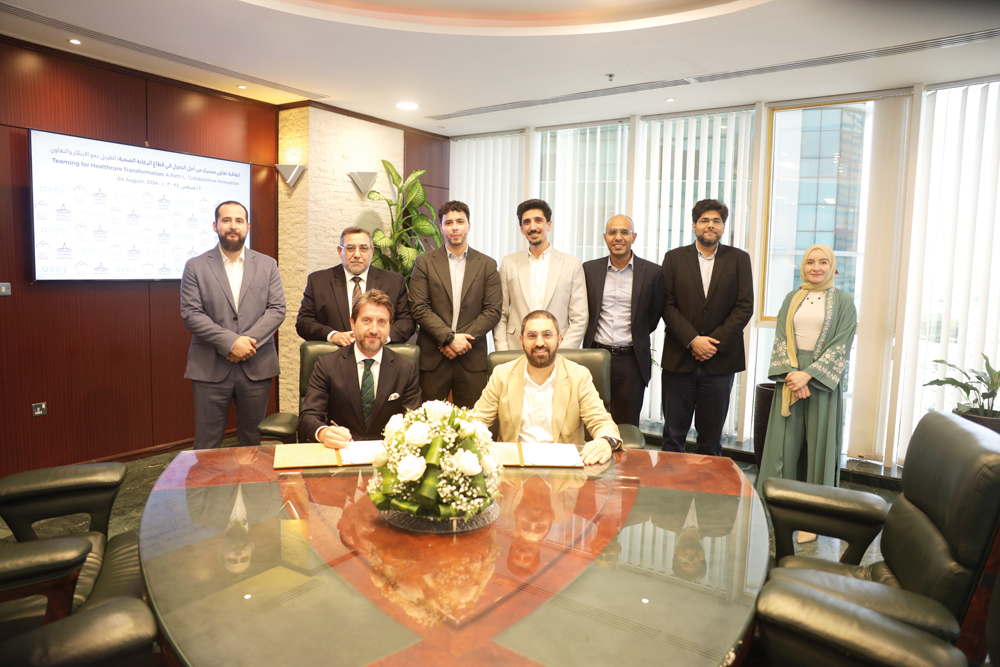 Officials from Aamal Company and its subsidiary during the signing of strategic partnership.