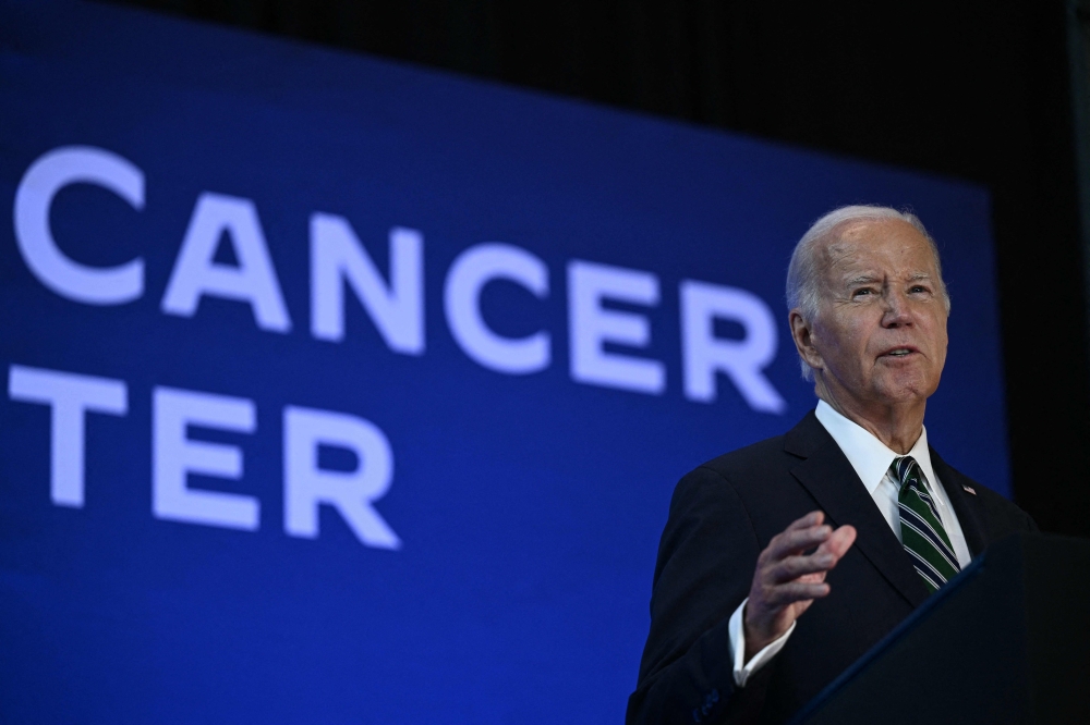 US President Joe Biden speaks at a Biden Cancer Moonshot Event at Tulane University in New Orleans, Louisiana, on August 13, 2024. (Photo by Brendan Smialowski / AFP)

