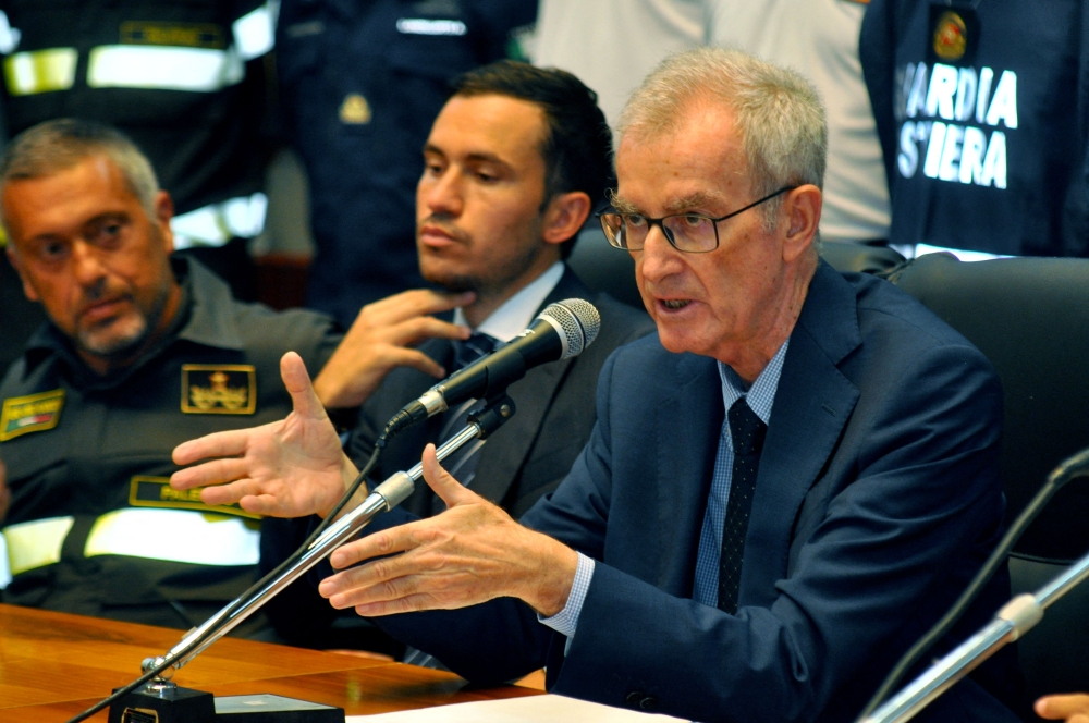 The chief of the public prosecutor's office of Termini Imerese Ambrogio Cartosio speaks next to Italian prosecutor Raffaele Cammarano during a press conference on August 24, 2024 in Termini Imerese, Sicily. (Photo by Alessandro FUCARINI / AFP)

