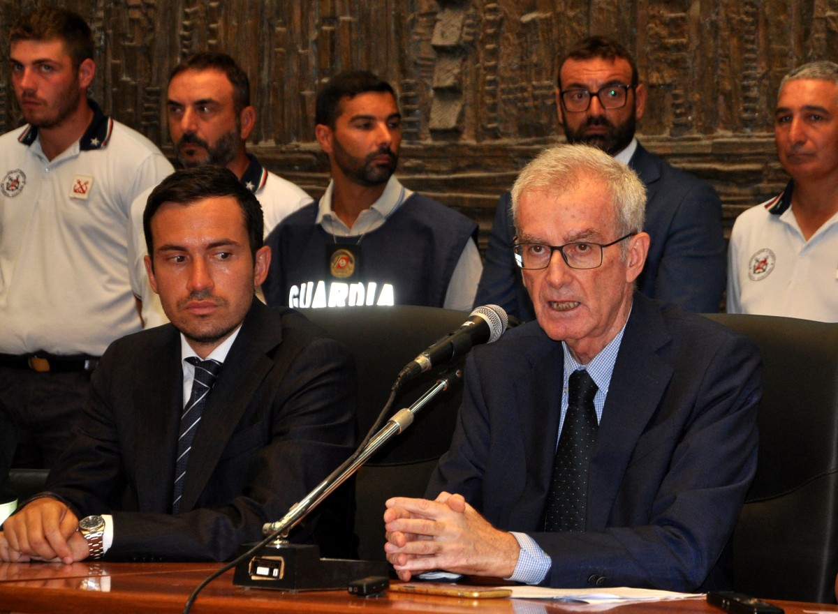 Prosecutor Raffaele Cammarano (L) and the chief of the public prosecutor's office of Termini Imerese Ambrogio Cartosio (R) give a press conference on August 24, 2024 in Termini Imerese, Sicily. Photo by Alessandro FUCARINI / AFP.
