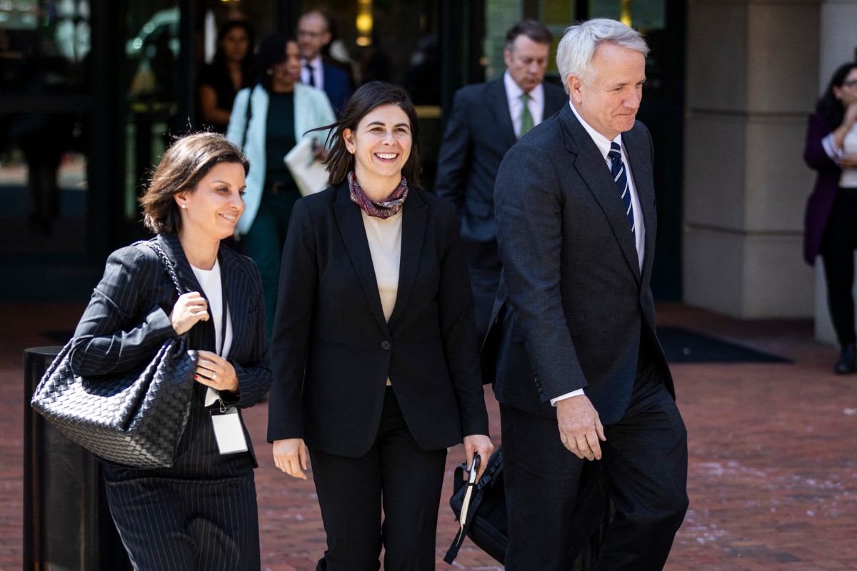 Justina Sessions (L) and Eric Mahr (R), lawyers representing Google, leave the Albert V. Bryan US Courthouse during a break of a Department of Justice antitrust trial against Google over its advertiing business in Alexandria, Virginia, on September 9, 2024. Photo by SAMUEL CORUM / AFP.