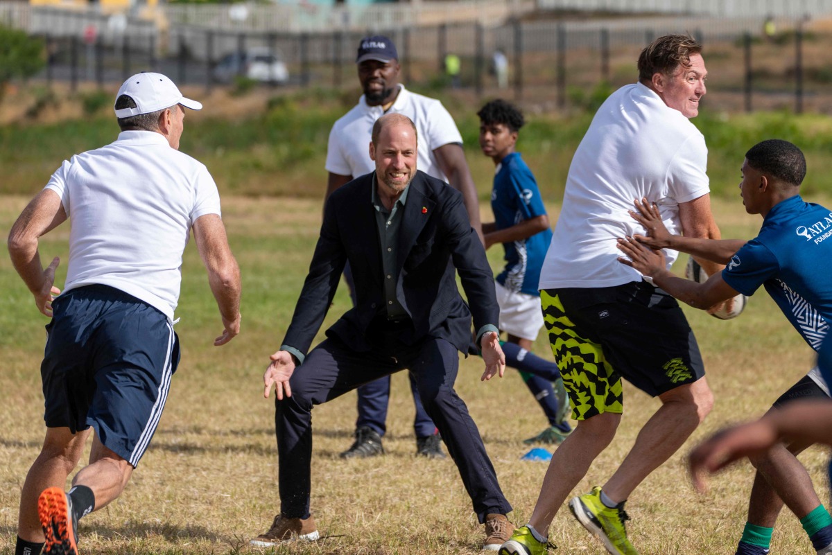 Prince William plays rugby on S.Africa climate prize visit