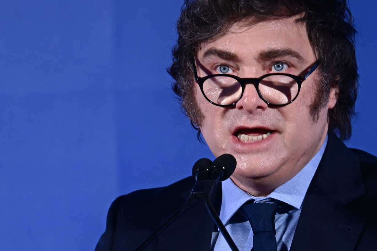 (FILES) Argentina's President Javier Milei attends the Atreju political meeting organised by the young militants of Italian right wing party Brothers of Italy (Fratelli d'Italia) on December 14, 2024 in Rome. (Photo by Filippo MONTEFORTE / AFP)
