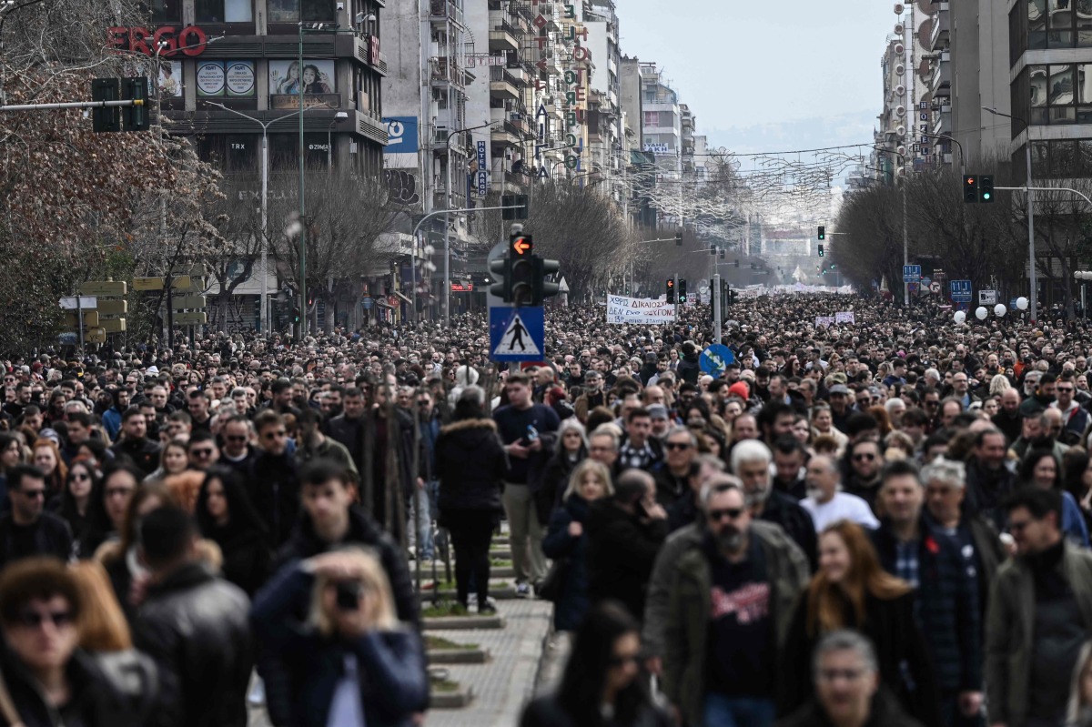 Protesters take part in a rally during a general strike called by unions to mark the second anniversary of Tempi railway collision in February 2023, in Thessaloniki on February 28, 2025. Photo by Sakis Mitrolidis / AFP